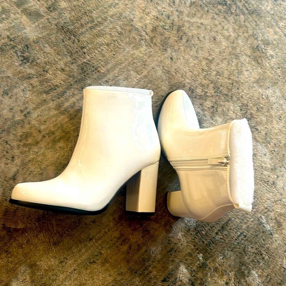 AllegraK white patent leather booties. New in box. Size 7.5 but runs a bit small